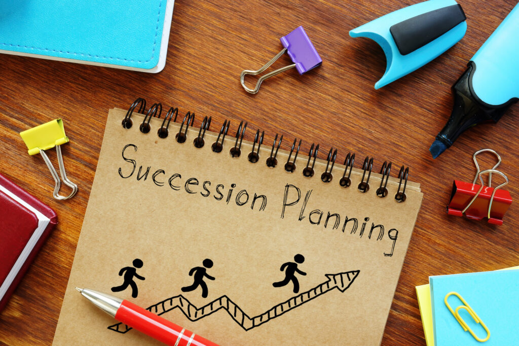 Succession Planning is shown on a business photo using the text