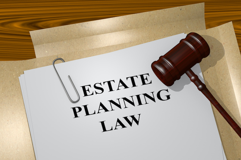 3D illustration of 'ESTATE PLANNING LAW' title on Legal Documents