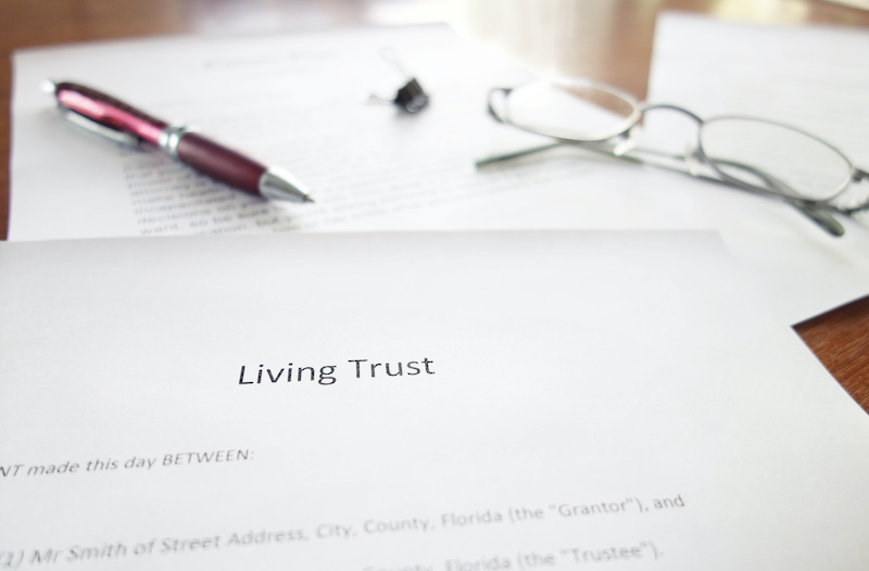 A Living Trust legal document on a desk