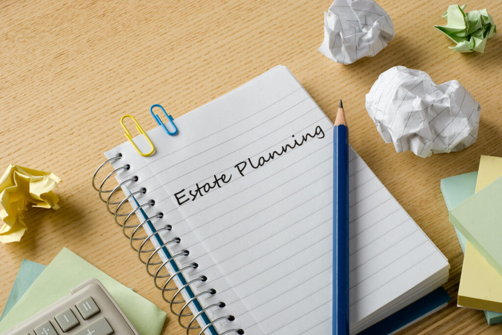 estate plan on notebook on desk