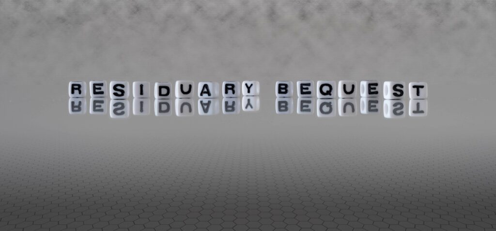 residuary bequest word or concept represented by black and white letter cubes on a grey horizon background stretching to infinity