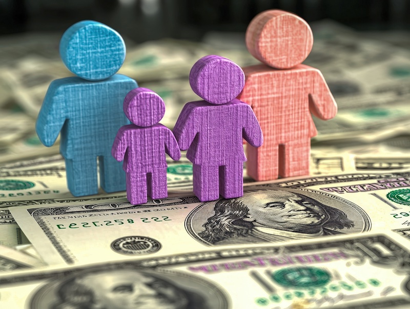 Colorful family figures standing on a pile of money, representing financial planning and family wealth.