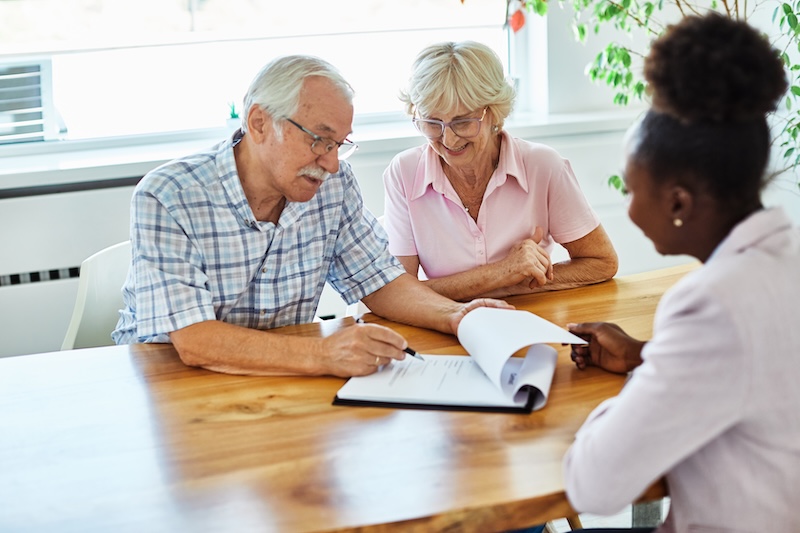 Married couple reviewing paperwork for AB Trusts