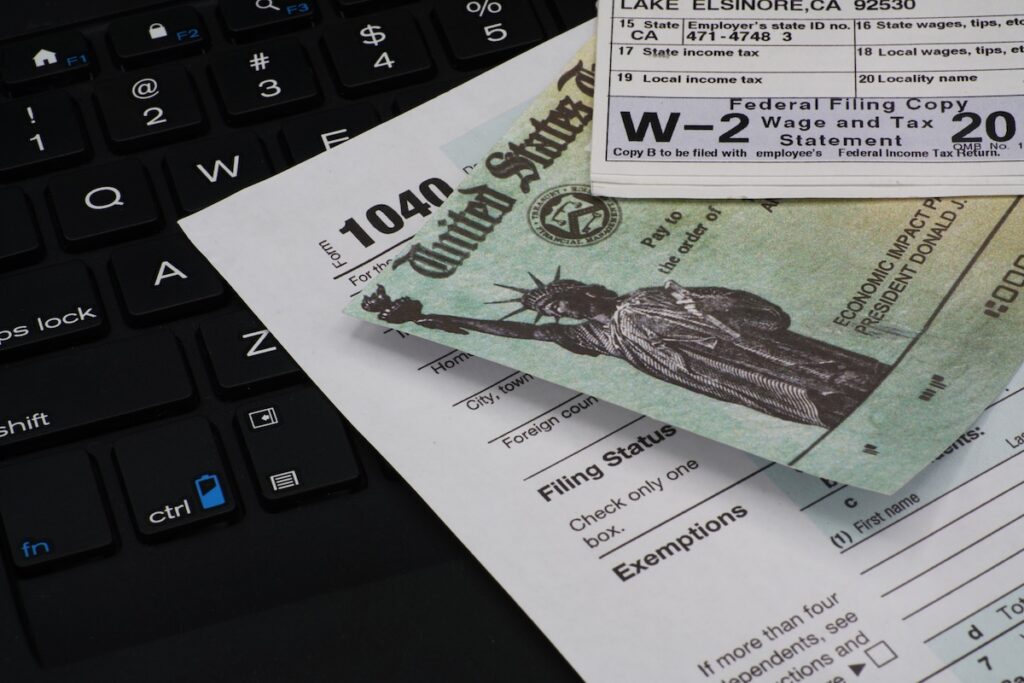 US IRS Internal Revenue Service income tax form 1040 with supporting documents. 3x2 aspect ratio