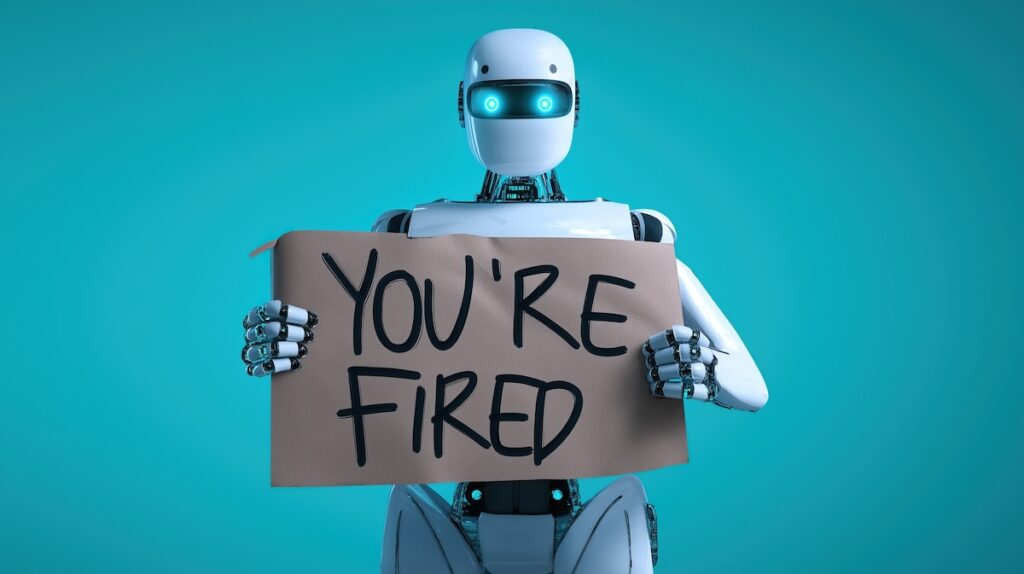 A humanoid robot holding a You're Fired sign symbolizing unemployment, AI agents and AGI technology using agentic superintelligence in the future for autonomy and the growth of ASI during the singularity