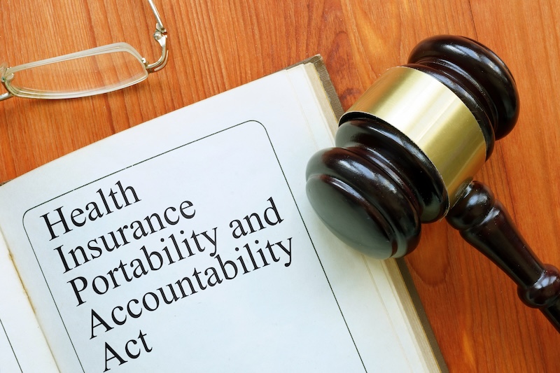 Health Insurance Portability and Accountability Act is shown on the conceptual business photo