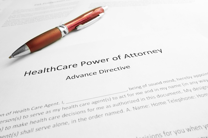 Healthcare Power of Attorney document with pen