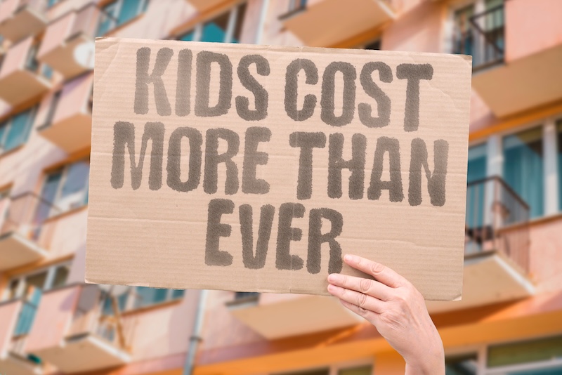 "Kids Cost More Than Ever" The total financial investment required to raise a child has increased substantially across all income levels. PARENT. COST. CHILD. AFFORD. BIRTH.